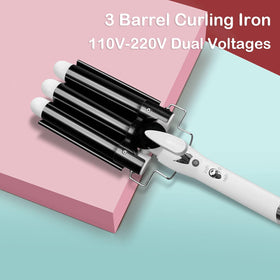 Aleath sleek black styling tool on a vanity surface.