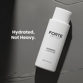 Full bottle with pump in natural light for daily hair care