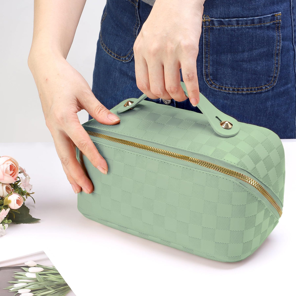ALEXTINA green travel makeup bag combining style and function.