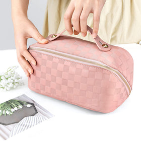 ALEXTINA waterproof makeup bag keeps contents protected in unpredictable weather.