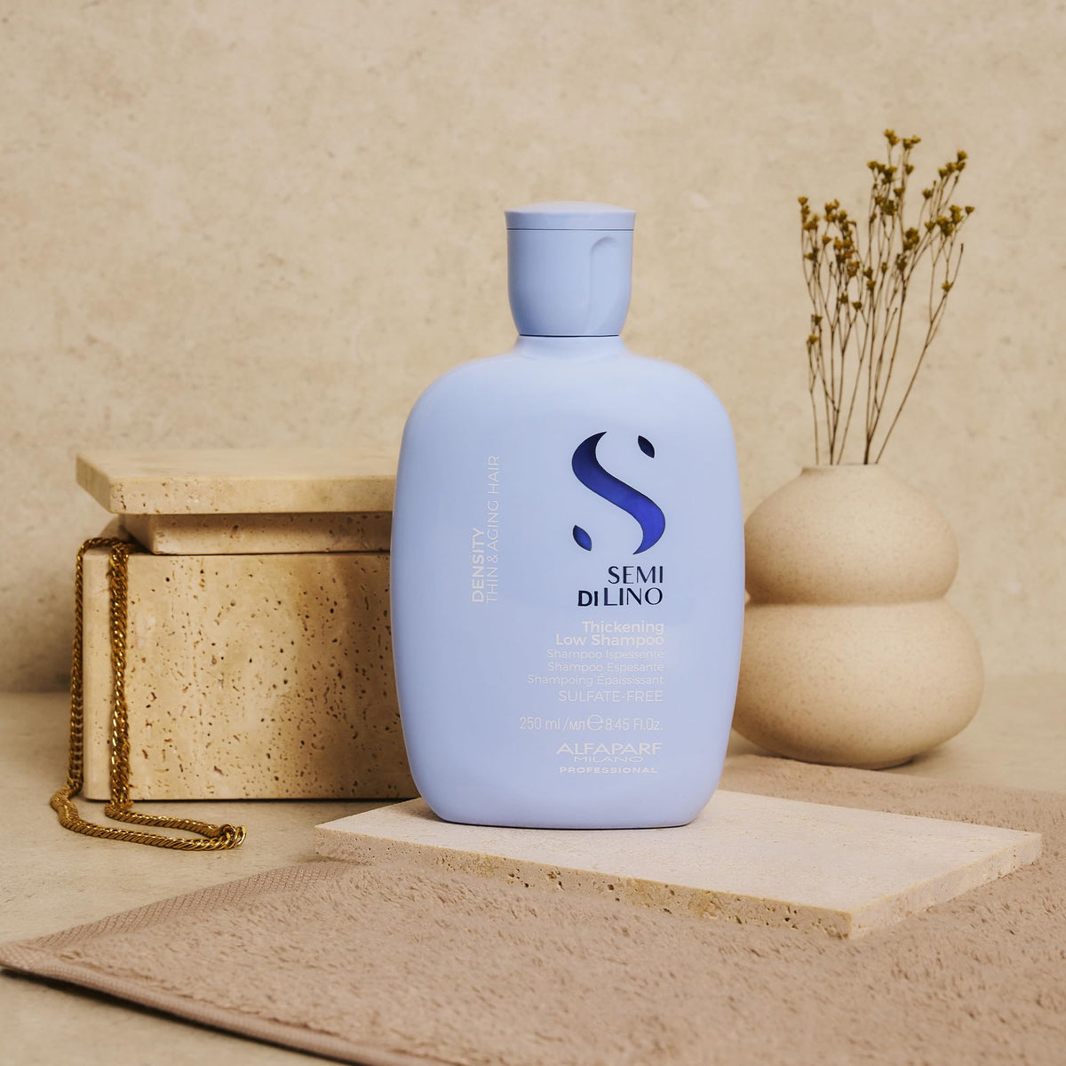 ALFAPARF Milano Density Shampoo bottle with vegan formula badge.