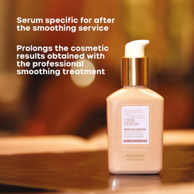 ALFAPARF MILANO Lisse Design hands applying serum on hair.