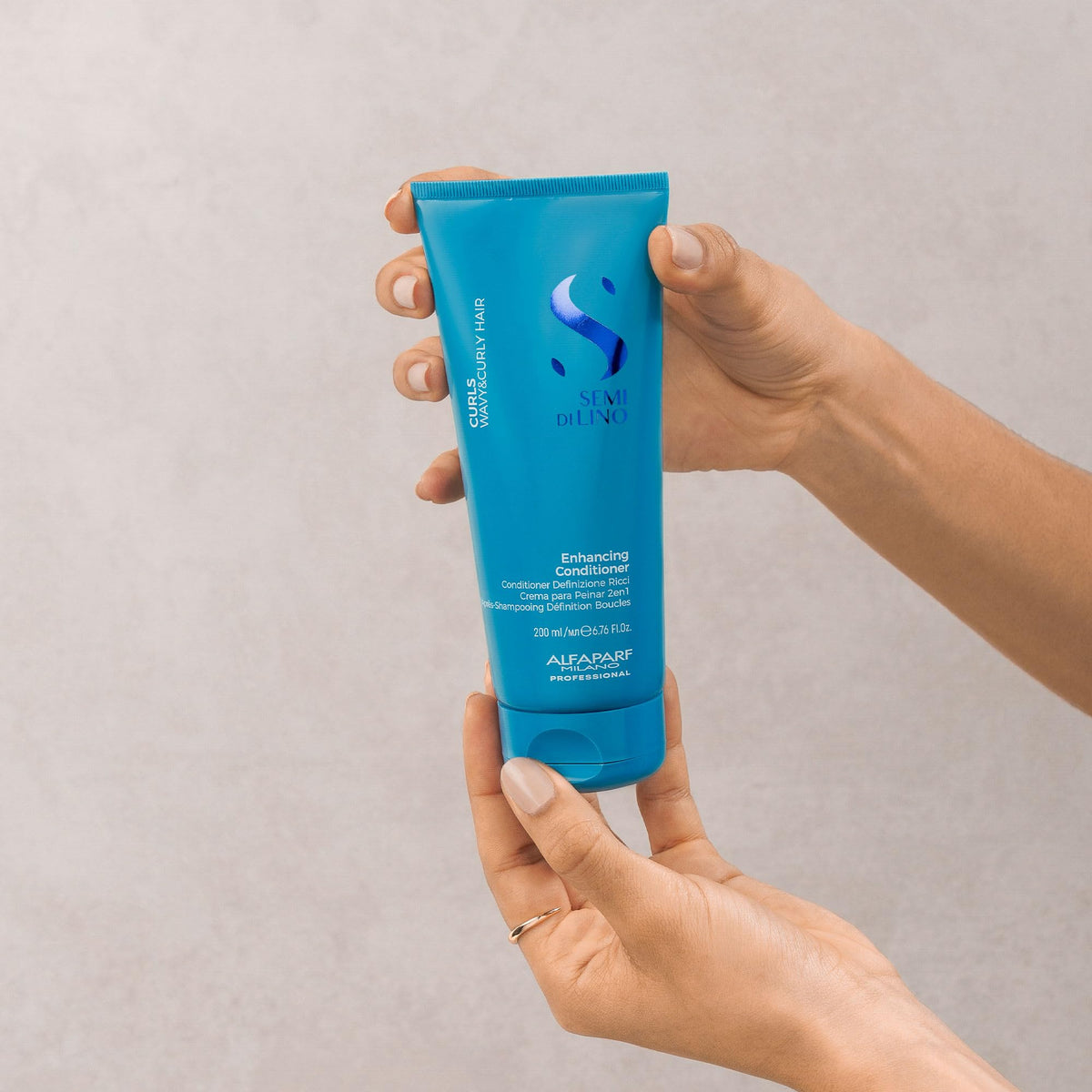 Alfaparf Milano Curls leave-in action for lightweight manageability.