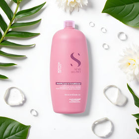 Semi Di Lino Moisture Nutritive leave-in texture close-up showing smoothing and shine