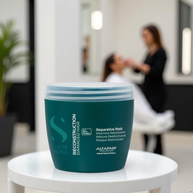 Alfaparf Milano Reconstruction Mask jar close-up emphasizing vegan formula and eco-friendly packaging.