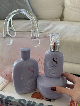 Frizz Defeat Protein label communicates anti-frizz support for soft, controlled hair.