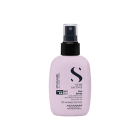 ALFAPARF MILANO Semi di Lino Style Sea Spray bottle pour creates beachy texture.