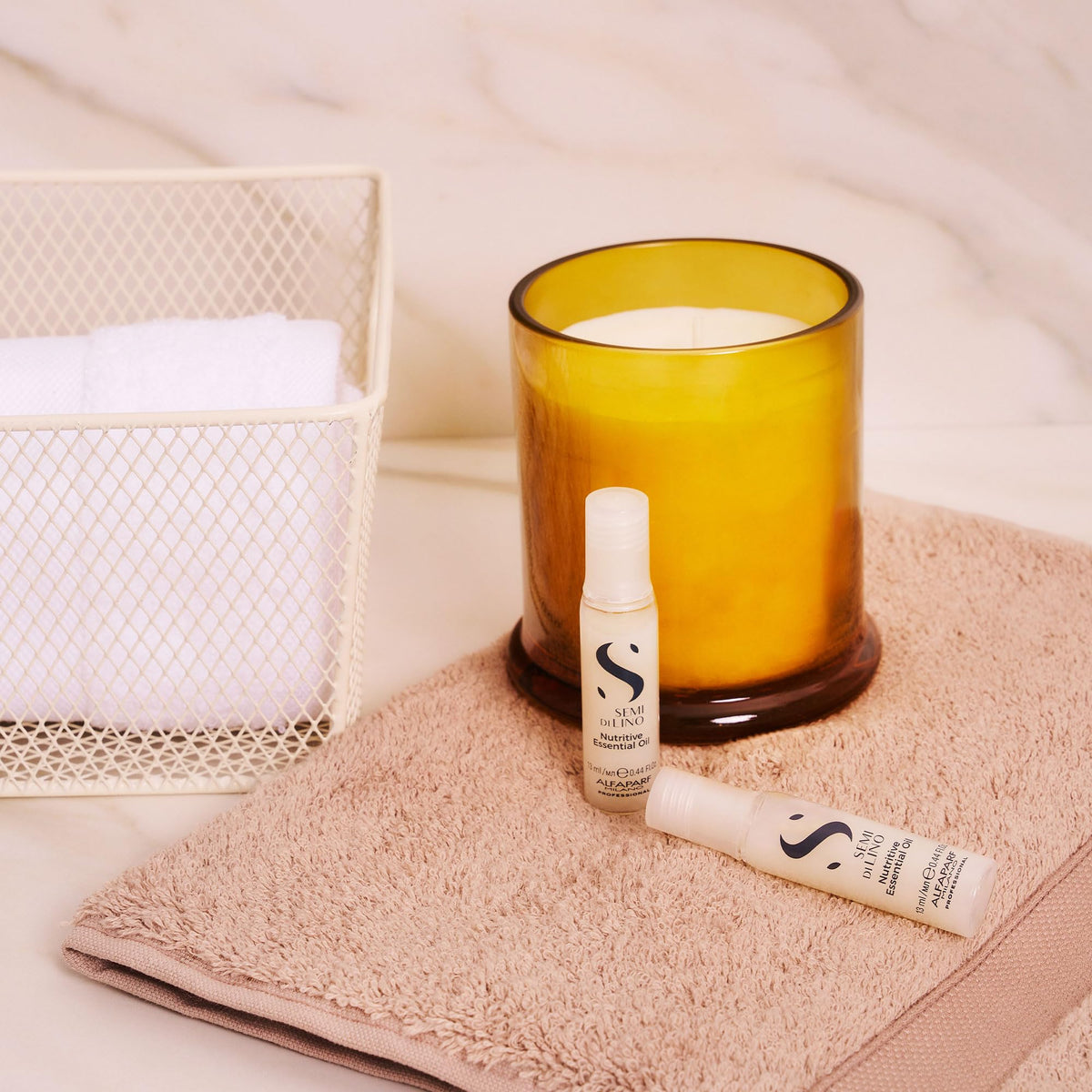 Alfaparf Milano oil dispensing on hair to support detangling