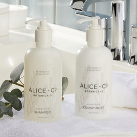 Alice + Co. hotel amenities collection on bathroom display.