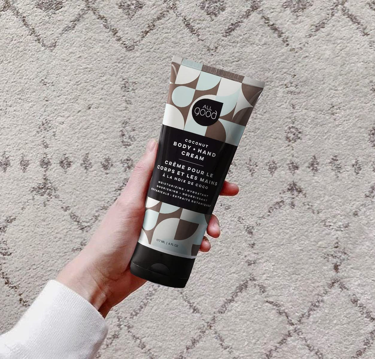 All Good Body Lotion Coconut tube label highlighting sustainability.