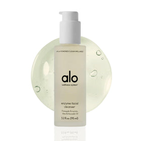 Alo Enzyme Facial Cleanser bottle with pineapple enzymes for gentle exfoliation and a smooth complexion.