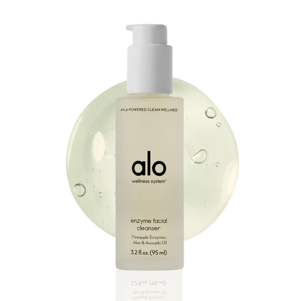 Alo Enzyme Facial Cleanser bottle with pineapple enzymes for gentle exfoliation and a smooth complexion.