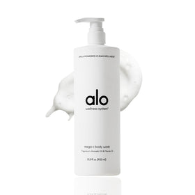 Alo Mega-C Body Wash bottle being poured for refreshing cleanse