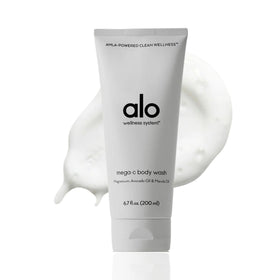 Alo Mega-C Body Wash bottle pouring with citrus scent for refreshing cleanse.