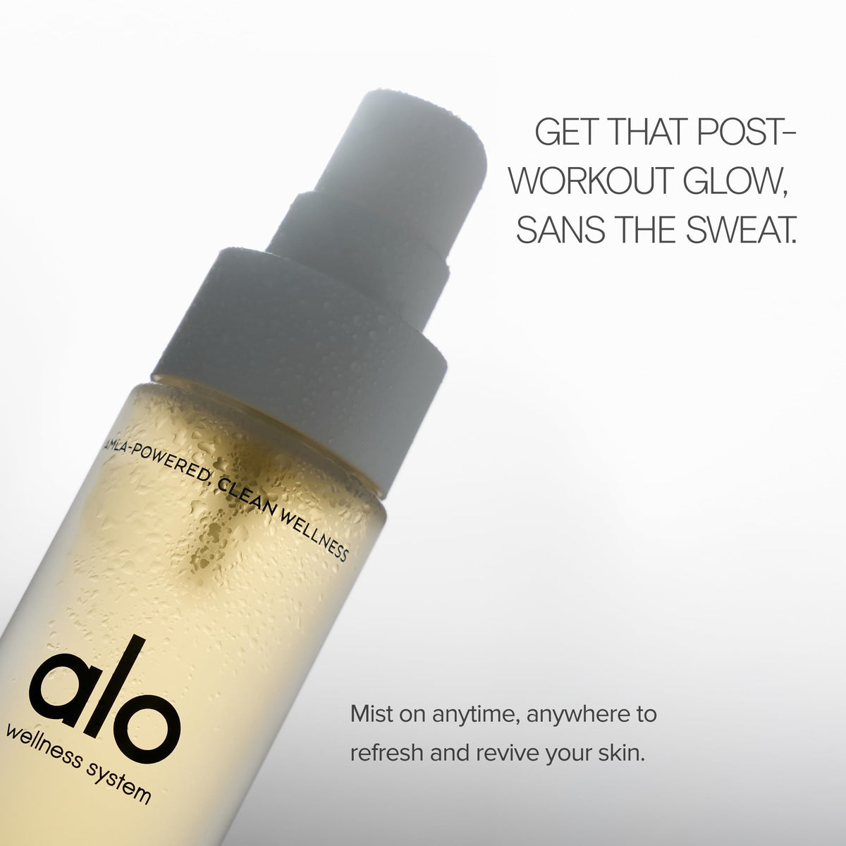 Close-up of the spray delivering a refreshing mist with ALO Yoga Insta Glow Face Mist.