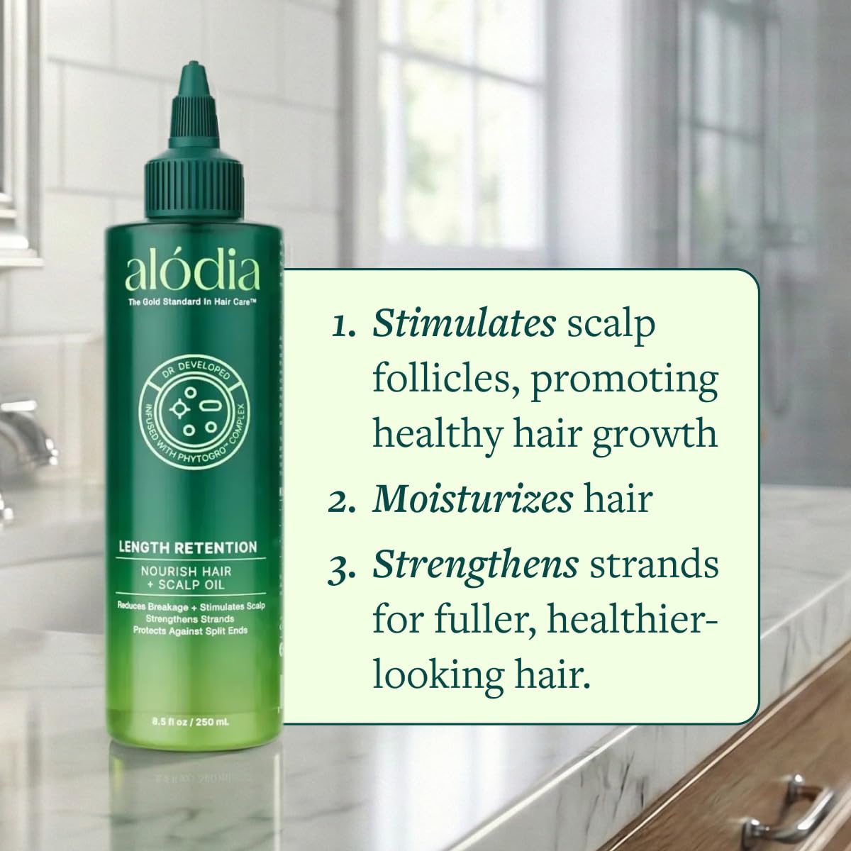 ALODIA Nourish & Grow apricot oil texture shows rich, non-greasy moisture.