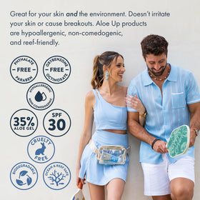Applying Aloe Up Sport Sunscreen on the forearm during outdoor run for protection.
