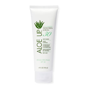 Aloe Up White Collection sunscreen spray application for even coverage and UV protection