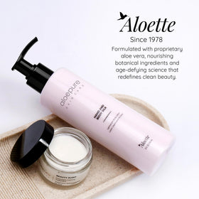 Aloette Hand and Body Silk Lotion ingredients label emphasizes aloe and coconut care.