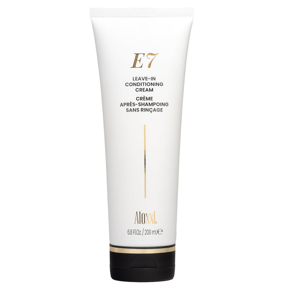 ALOXXI E7 leave-in conditioning cream bottle delivering hydration and frizz control.