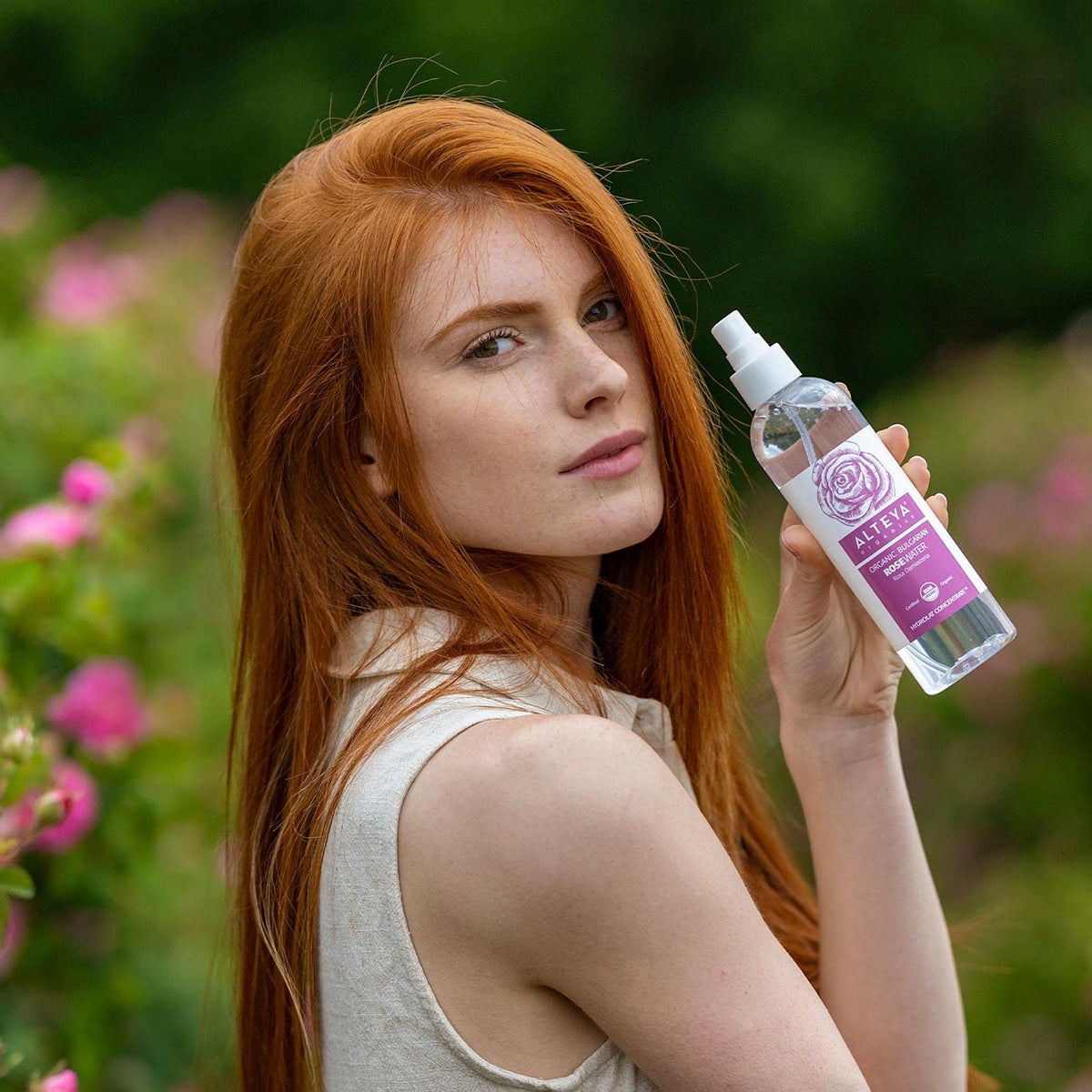 Alteya Organics Rose Water on skin for gentle hydration massage.
