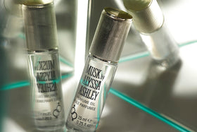 Alyssa Ashley Musk perfume oil application dab showing easy, subtle use