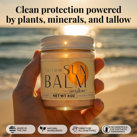 Amallow tallow sun balm on hand blending into skin for a warm natural finish