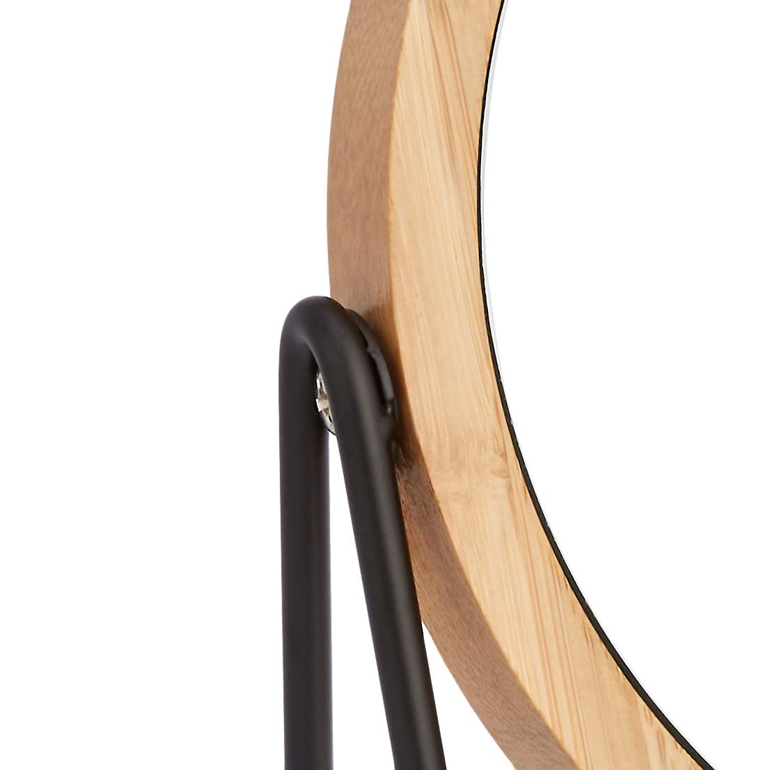 Amazon Basics vanity mirror with iron-coated base and 360-degree rotation feature.