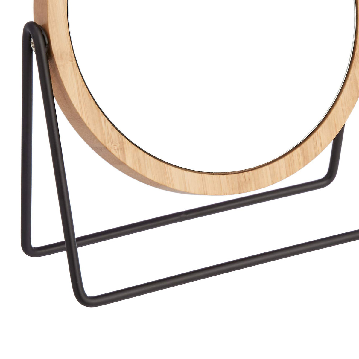 Amazon Basics vanity mirror bamboo rim close-up highlights the frame.