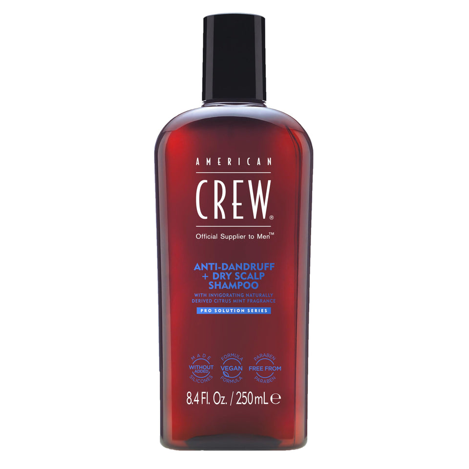 American Crew anti-dandruff shampoo bottle for refreshed scalp and clean hair.