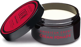 Hands applying the pomade for smooth, frizz-free definition.