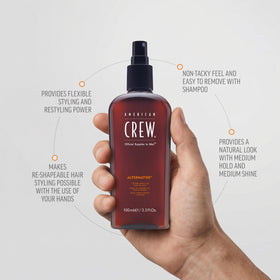 Hands shaping hair with American Crew Hair Spray for flexible, non-tacky finish.