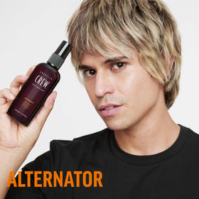 Close-up of the spray mist from American Crew Hair Spray for effortless hold.