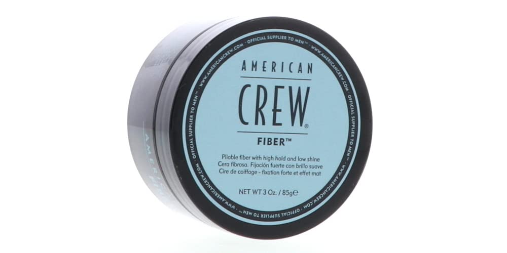 American Crew Men Fiber hands applying product for texture hold