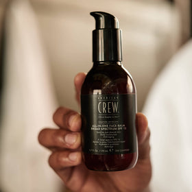 Men's grooming routine featuring American Crew All-in-One Face Balm.
