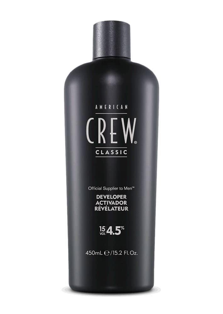 Close-up of American Crew Precision Blend Developer showing the 15 volume formula for even deposition.