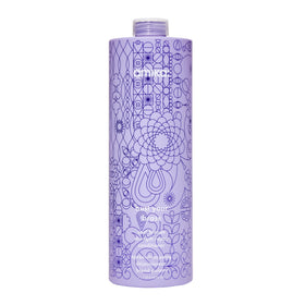 Amika bust your brass cool blonde conditioner bottle pour for controlled application and quick toning.