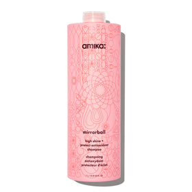 Amika Mirrorball Shampoo bottle pour highlights radiant shine and ease of application