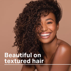 Shine-n-Jam Edges adds non-greasy shine while taming flyaways during styling