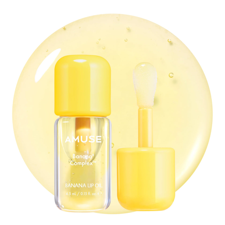 Amuse SEOUL Banana Lip Oil bottle pour shows hydrating shine.