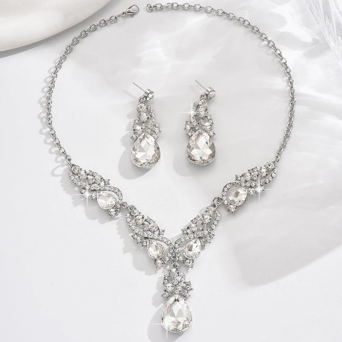 AMZCOS package includes wig, necklace, earrings, and wig cap.