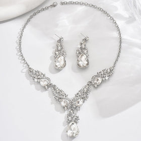 AMZCOS package includes wig, necklace, earrings, and wig cap.