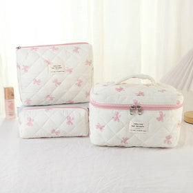 AMZMA travel-friendly makeup bag keeps cosmetics organized during trips.
