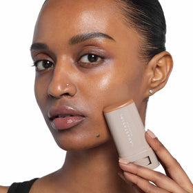 Skin finish close-up highlighting dewy, breathable glow and soft-satin coverage