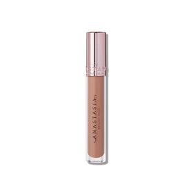 Anastasia Beverly Hills Butterscotch swatch on lips delivering luminous, layered finish