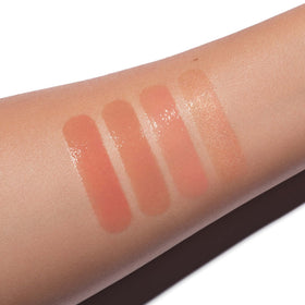 Anastasia Beverly Hills lip gloss Deep Taupe swatch reveals luminous finish.