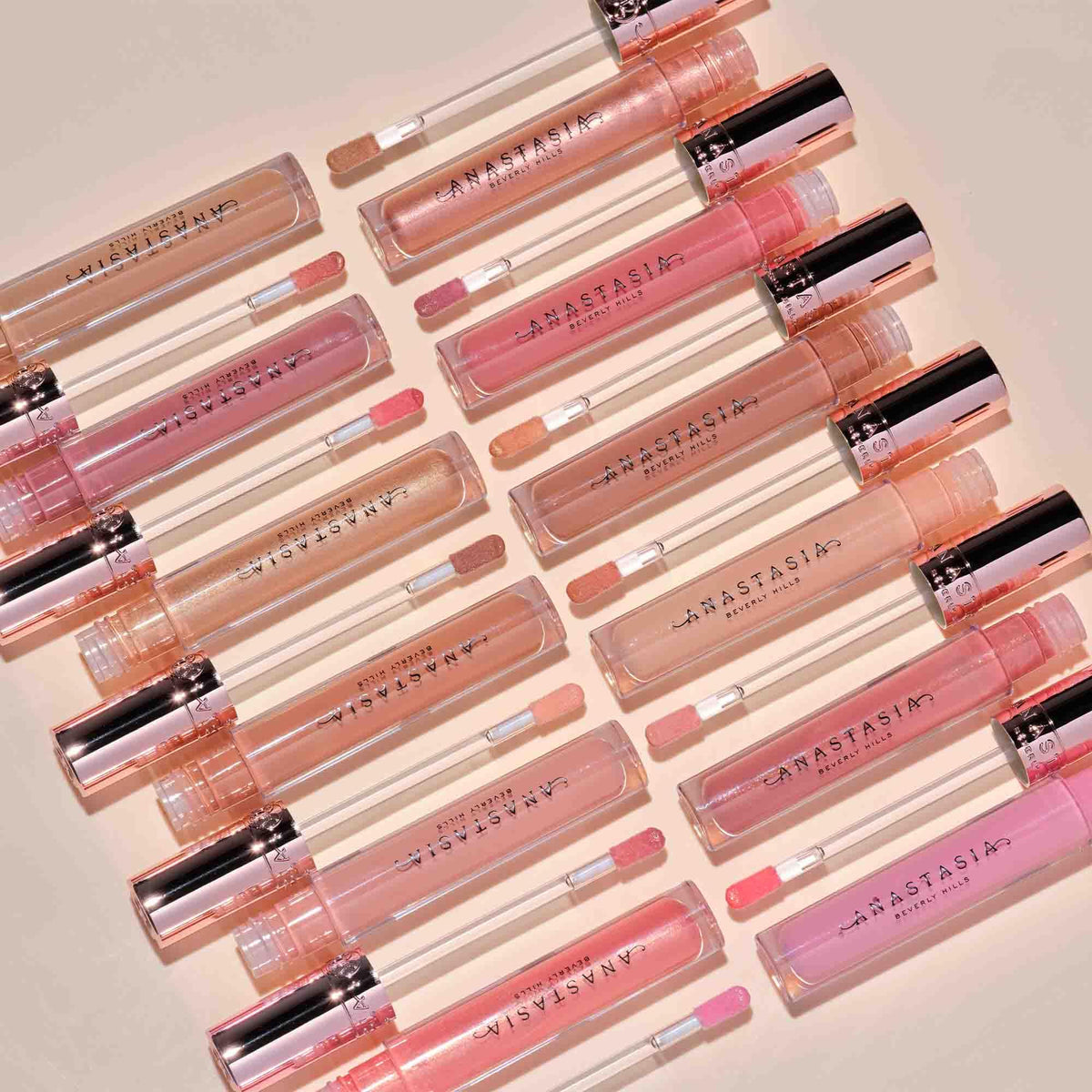 Applicator of Honey Kiss lip gloss ready for precise application