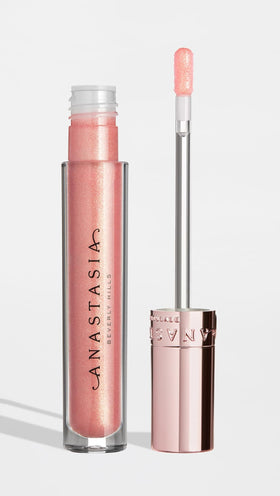 Anastasia Beverly Hills Peachy lip gloss on lips with radiant shine