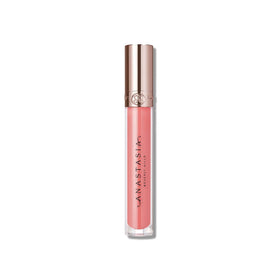 Anastasia Beverly Hills Soft Pink gloss swatches with creamy pink sheen.