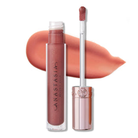 Anastasia Beverly Hills Toffee Rose on lips for a shiny, subtle glow.